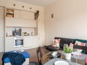 A kitchen or kitchenette at The Best Rent - Bright two rooms apartment near Cattolica University