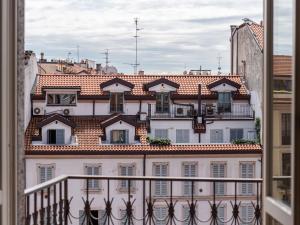 A balcony or terrace at The Best Rent - Bright two rooms apartment near Cattolica University