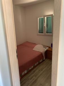 Posteľ alebo postele v izbe v ubytovaní Sunny Side Apartments