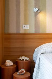Postel nebo postele na pokoji v ubytování Hotel Rosa