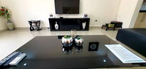
A television and/or entertainment centre at Artem Apartments - Flat 1
