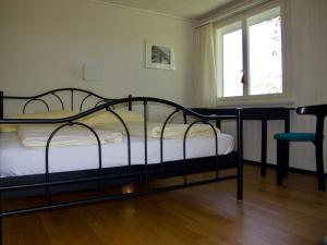 Hotel Cafe Seeblick客房内的一张或多张床位