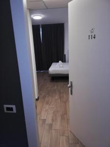 Hotel Bocciolo客房内的一张或多张床位