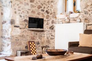 TV a/nebo společenská místnost v ubytování Lamprou
