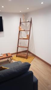 TV a/nebo společenská místnost v ubytování Aptos Cama Del Rey 2 dormitorios