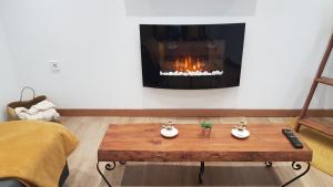 Posezení v ubytování Aptos Cama Del Rey 2 dormitorios