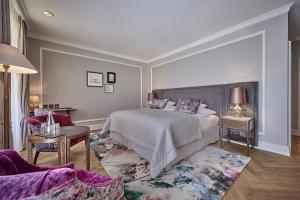 Ein Bett oder Betten in einem Zimmer der Unterkunft Victoria Jungfrau Grand Hotel & Spa