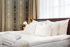 Postel nebo postele na pokoji v ubytování Hotel Rott