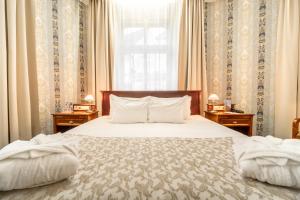 Postel nebo postele na pokoji v ubytování Hotel Rott