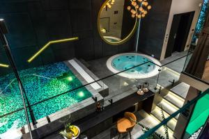 an overhead view of a swimming pool in a hotel at Marconio Wellness Private Pool & SPA - City Center in Belgrade