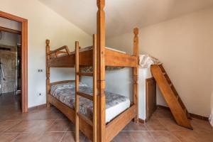Uma ou mais camas em beliche num quarto em Villa Mallus 5 posti letto