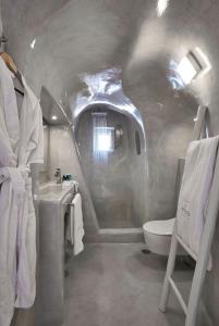 A bathroom at Amaya Sensational Villa Caldera View-Outdoor Hot Tub Oia Santorini