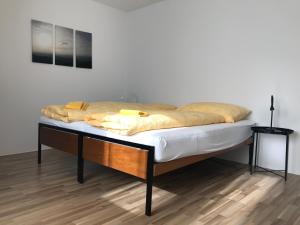 a bed in a room with at Muralto-Locarno: Miramonti Apt. 17 in Locarno