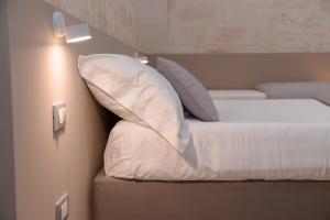 A bed or beds in a room at Litium 3