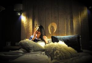 A bed or beds in a room at Dar Elrio