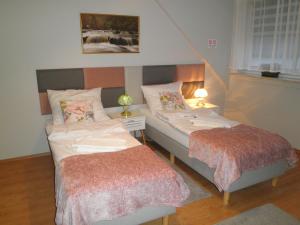 Postel nebo postele na pokoji v ubytování Apartament Esja