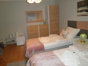 Postel nebo postele na pokoji v ubytování Apartament Esja