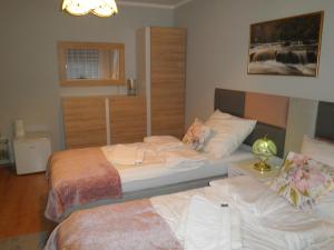 Postel nebo postele na pokoji v ubytování Apartament Esja