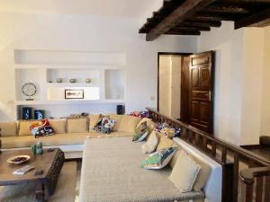 A seating area at Villa Mare Bella Chao sea view private heated solar pool AC