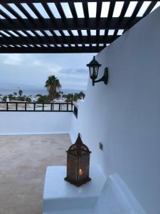 A balcony or terrace at Villa Mare Bella Chao sea view private heated solar pool AC