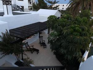 A balcony or terrace at Villa Mare Bella Chao sea view private heated solar pool AC