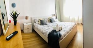 a bedroom with a bed with two teddy bears on it at Villa huetor Cerca de sierra Nevada in Huétor Vega +29 photos