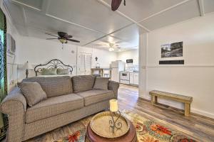 a living room with a couch and a table at Pet-Friendly Canyon Lake Studio Fish, Boat, Relax in Canyon Lake