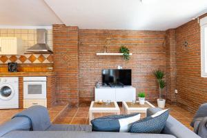Kuchyň nebo kuchyňský kout v ubytování Apartamento Alberti