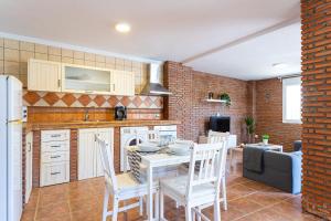 Kuchyň nebo kuchyňský kout v ubytování Apartamento Alberti