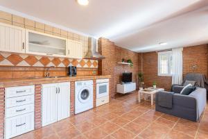 Kuchyň nebo kuchyňský kout v ubytování Apartamento Alberti