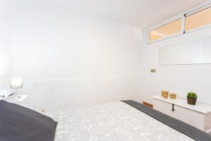 Postel nebo postele na pokoji v ubytování Apartamento Alberti