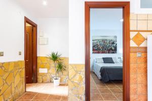 Postel nebo postele na pokoji v ubytování Apartamento Alberti