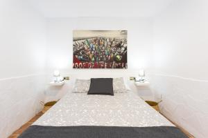 Postel nebo postele na pokoji v ubytování Apartamento Alberti
