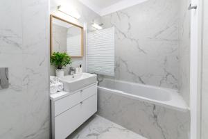 Ванная комната в North Cozy Apartment - Aviatiei