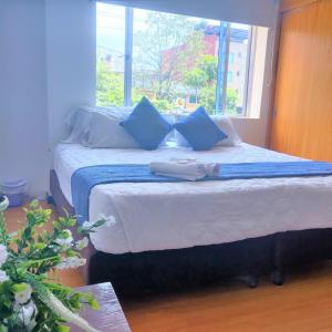 Cama o camas de una habitación en Hotel Blue Zafiro