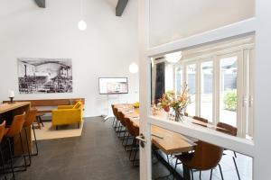 Reštaurácia alebo iné gastronomické zariadenie v ubytovaní Bed & Breakfast De Oude Kapel