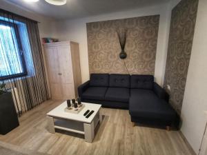 Posedenie v ubytovaní Á-B Apartman