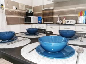 Kuchyňa alebo kuchynka v ubytovaní Á-B Apartman