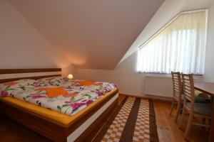 Postel nebo postele na pokoji v ubytování Ubytovanie DITA