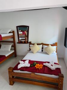 Postel nebo postele na pokoji v ubytování Hotel Paso Realce