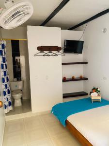 Postel nebo postele na pokoji v ubytování Hotel Paso Realce