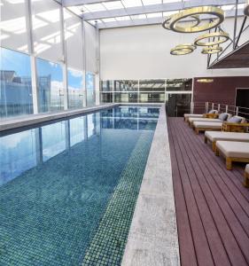 a pool on the top of a building at Fiesta Americana Ciudad de Mexico Toreo in Mexico City