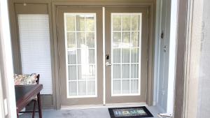 an entrance to a house with a door and windows at Comfy 1BR Apartment - Ideal for Traveling Nurses & Professionals in Gainesville +31 photos