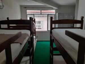 Postel nebo postele na pokoji v ubytování DS Hostel