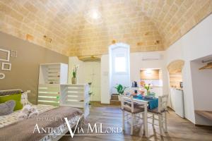 A seating area at Dimora Antica Via MiLord