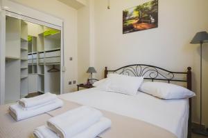 Posteľ alebo postele v izbe v ubytovaní Modern Maisonette