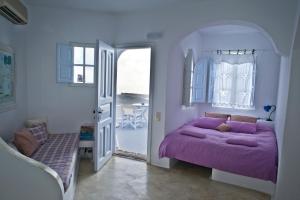A bed or beds in a room at Altana Heritage Suites