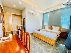 Postel nebo postele na pokoji v ubytování Gao Hotel