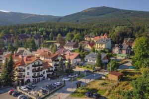 an aerial view of a small town in the mountains at Pensjonat Carmen in Szklarska Poręba