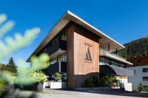 a building with the ak sign on it at Apart6580 in Sankt Anton am Arlberg